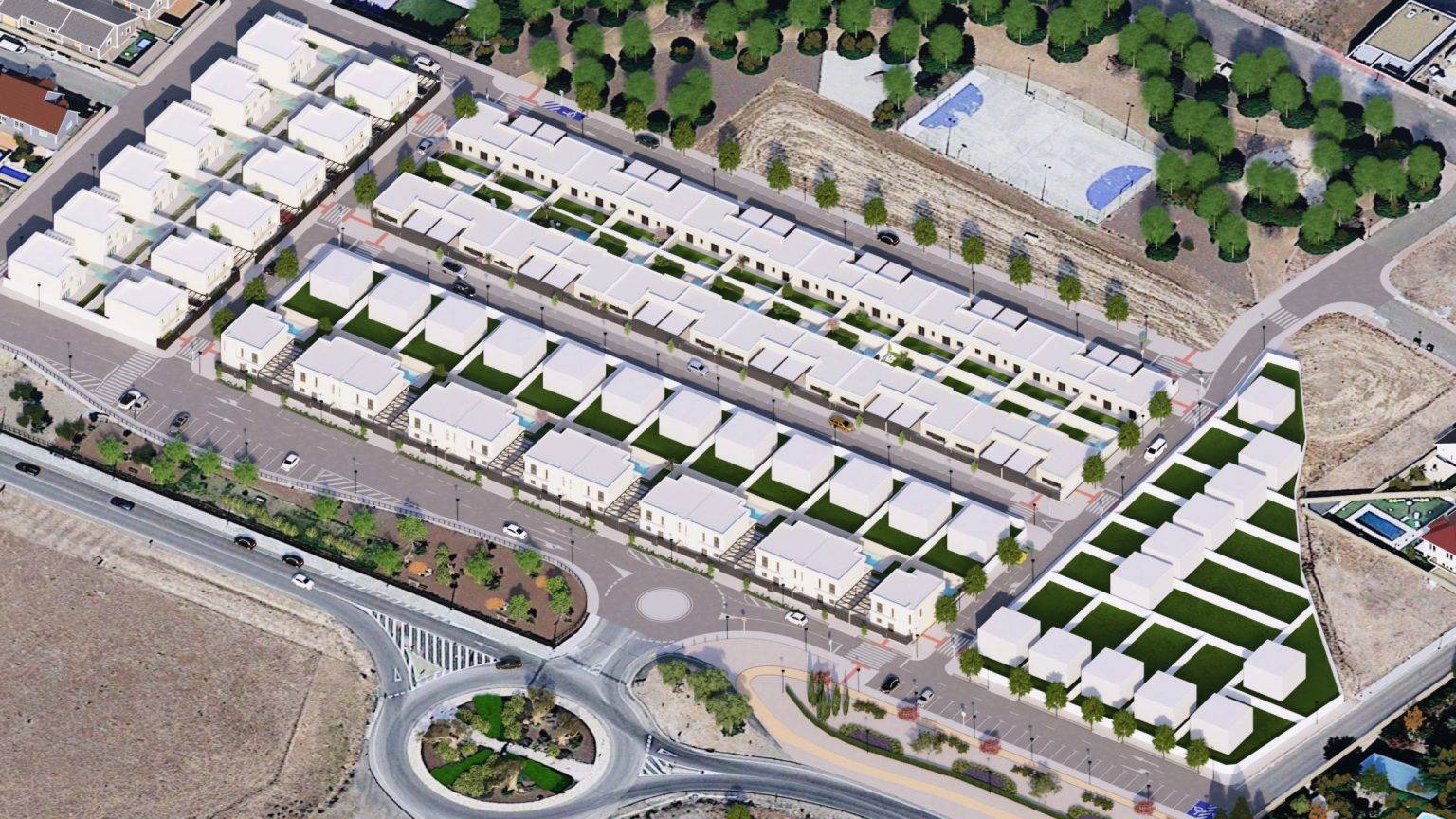 Vista aérea de una urbanización en Poblete, Ciudad Real, que muestra un conjunto de viviendas unifamiliares rodeadas de áreas verdes y espacios comunes. La disposición ordenada de las casas resalta el diseño moderno de la promoción inmobiliaria.